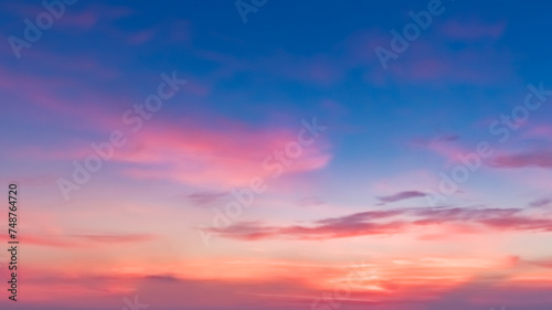 Sunset sky abstract background, blue sky background with tiny clouds. © AlexTaoWang