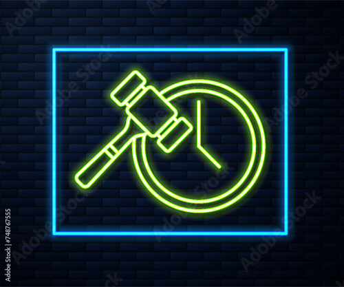 Glowing neon line Auction hammer icon isolated on brick wall background. Gavel - hammer of judge or auctioneer. Bidding process, deal done. Auction bidding. Vector