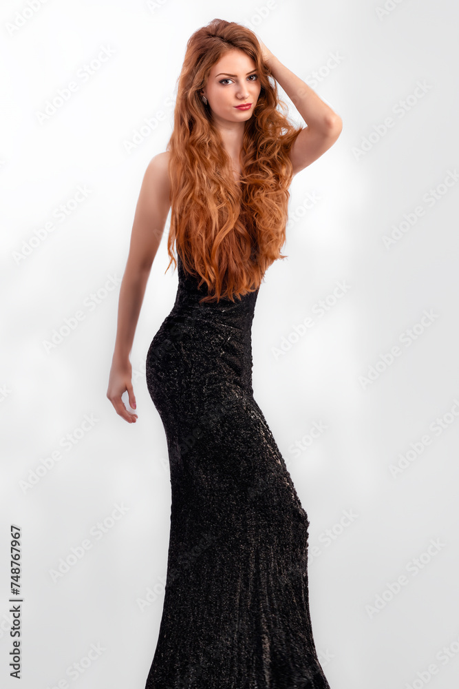 portrait of a beautiful woman with long red hair. portrait of a beautiful woman with long red hair.