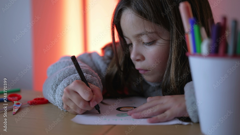 Artistic Child Deeply Engaged in Drawing, Focused on Paper with Coloring Pen, bucket of coloring pens in foreground Artistic Child Deeply Engaged in Drawing, Focused on Paper with Coloring Pen, bucket of coloring pens in foreground