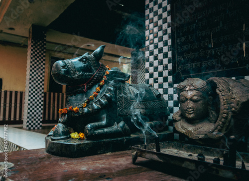 Ancient Handcrafted Nandi Stone Sculptures symbolic ride companion on Lord Shiva, Ekeshwar Mahadev Temple, Pauri Garhwal, photo