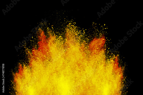 Abstract powder splatted background. Colorful powder explosion on black background. Colored cloud. Colorful dust explode. Freeze motion of orange color powder exploding 