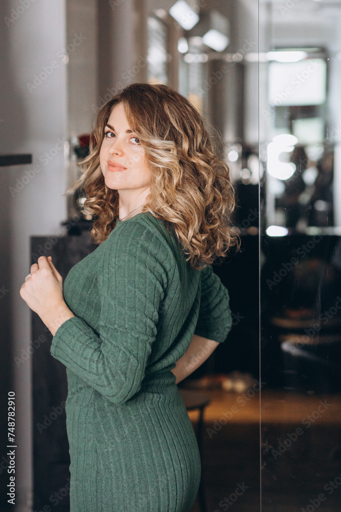elegant girl in a green dress, casual look elegant girl in a green dress, casual look