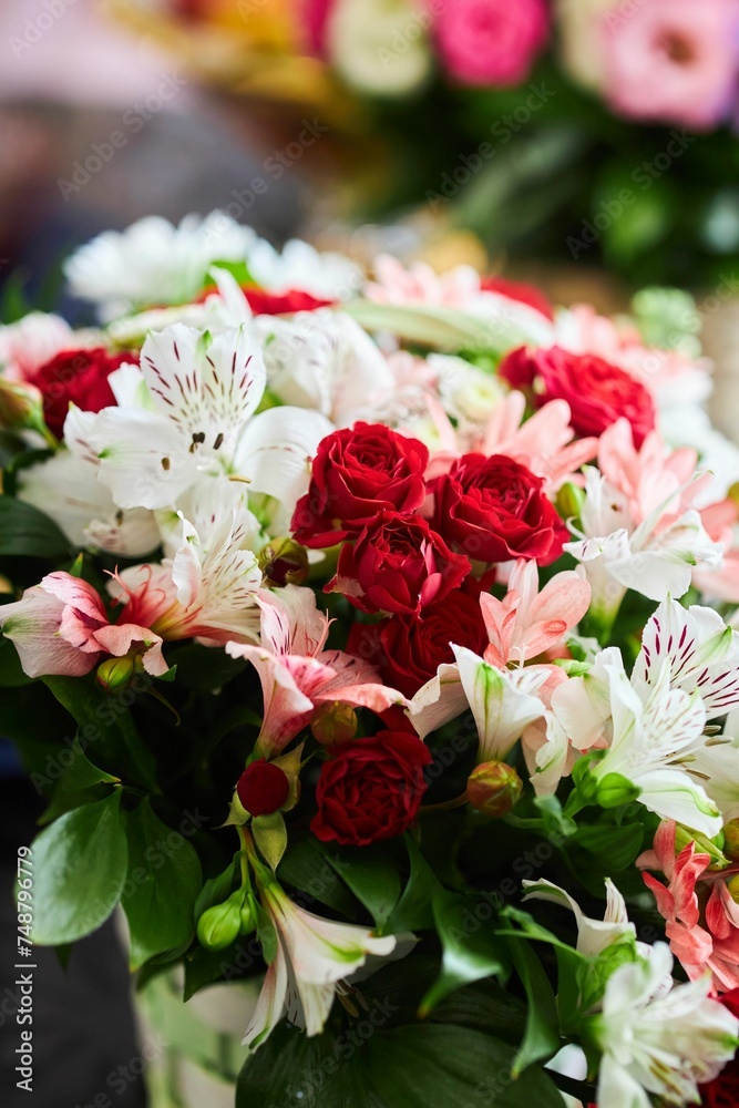 Flower arrangement from a florist, bouquet. A gift and decoration of an event or holiday. Flower arrangement from a florist, bouquet. A gift and decoration of an event or holiday.