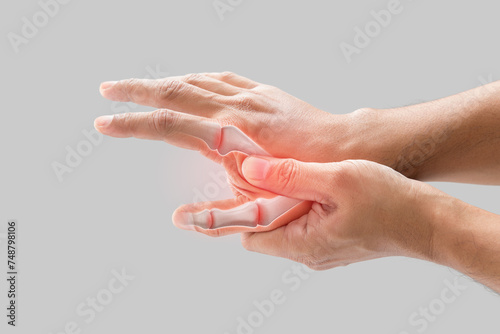 Fotografie A man has a sore palm because of inflammation of the finger bone.