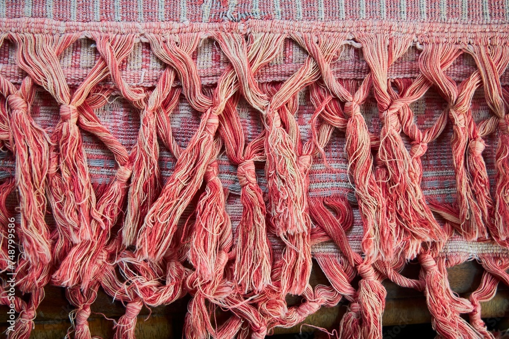 Fringe on an old rug or plaid. Vintage fabrics