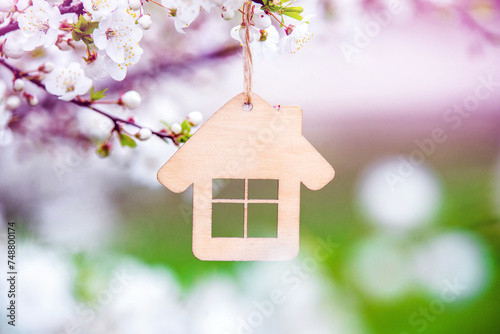 symbol of the house among the white cherry blossoms