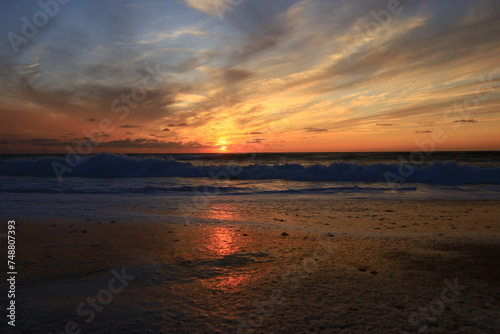 View on a sunset on a beach of Cap Ferret located at the southern end of the town of Lège-Cap-Ferret in the department of Gironde © marieagns