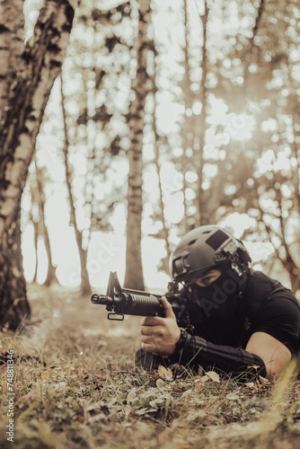 Soldier aiming to the target, and ready to shoot.