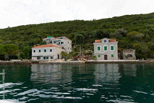 Montenegro, Beautiful sea towns, Residential houses by the sea, view from the water.