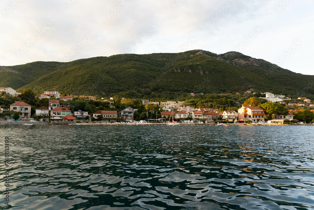 Montenegro, Beautiful sea towns, Residential houses by the sea, view from the water.