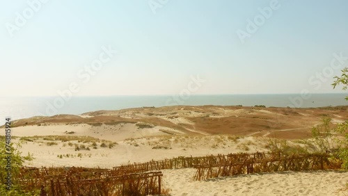 Panoramic view Curonian Spit national park. Parnidis dune in summer with baltic sea coast. Nida, Neringa, Lithuania. Dead Dunes. Death valley. The Curonian Lagoon photo