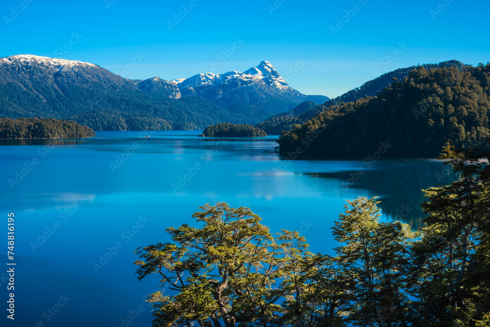 Pristine Mountain Lake with Reflective Waters and Lush Forest Pristine Mountain Lake with Reflective Waters and Lush Forest