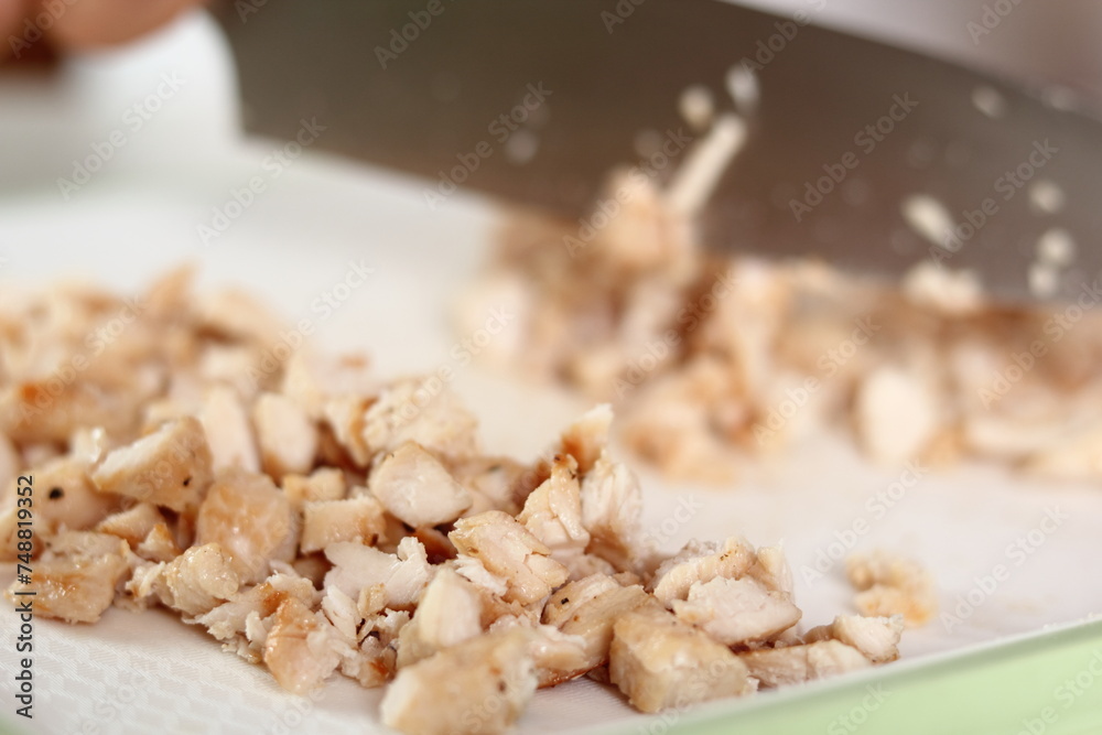 Cutting fried chicken fillet. Making Chicken and Egg Galette Series.