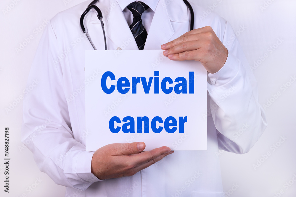 Doctor holding a card with Cervical Cancer medical concept Doctor holding a card with Cervical Cancer medical concept