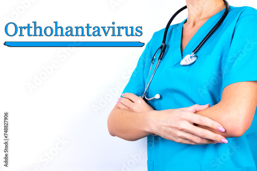 Doctor in medical clothes on a light background with the text Orthohantavirus. Medical concept. photo