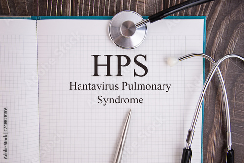 Notebook with title Hantavirus Pulmonary Syndrome HPS . photo