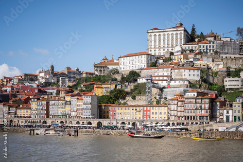 Porto, Portugal old town skyline from across the Douro River. © parkerspics