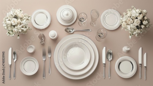 a beautifully set table adorned with plates, spoons, forks, and knives, the elegance and sophistication of the table setting, the anticipation of a delightful meal.