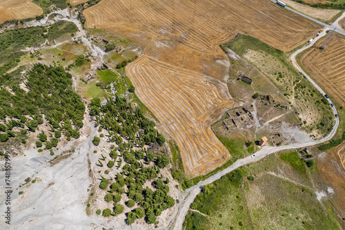 Aerial view land around ruins of village of Escó by Yesa reservoir in Spain, Summer 2023 photo