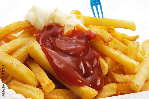 close up of fries and plastic fork