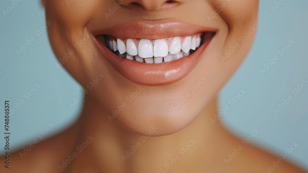 Close-up of a beautiful woman's radiant white smile suggesting health and happiness Close-up of a beautiful woman's radiant white smile suggesting health and happiness