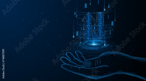 Hand holding abstract up and down arrows on dark blue background. The concept of digital data transmission or exchange. blue arrow technology background
