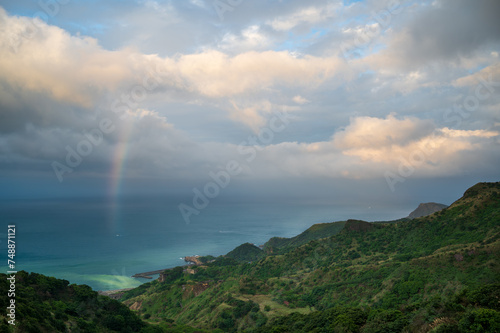 View of the sea, rainbows and moving clouds from the top of the mountain. Teapot Mountain Hiking Trail in Ruifang District, New Taipei City. Taiwan.