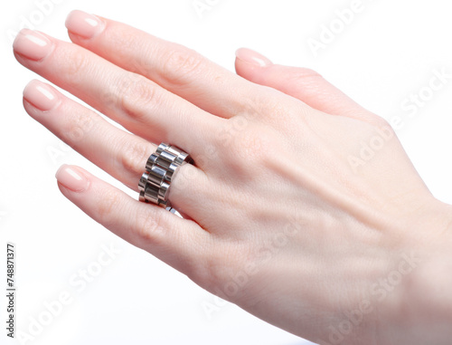 Jewelry silver ring bijouterie female hand on white background isolation
