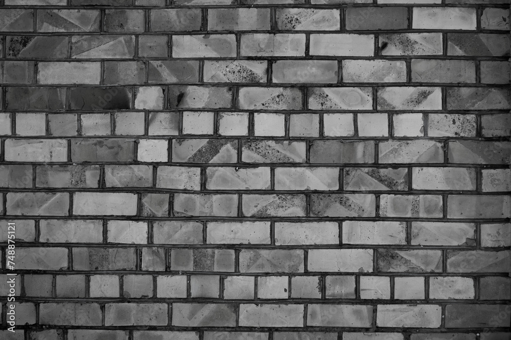 old brick wall close up in gray color