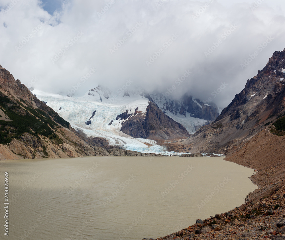 Laguna torre with the peaks covered in thick clouds in el chalten argentina Laguna torre with the peaks covered in thick clouds in el chalten argentina