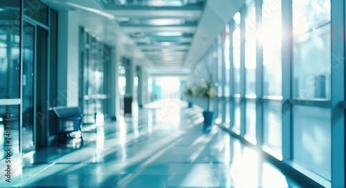Abstract Blurred Hospital Hallway with Reception Clinic in Blue Tones