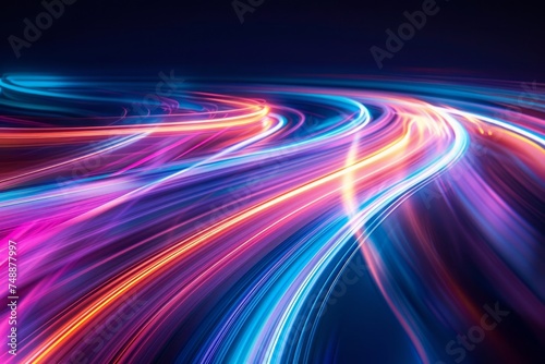 Abstract light trails with a dark background.