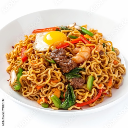 Bakmi Goreng: Stir-fried noodles cooked with vegetables, eggs, and a choice of protein (chicken, beef, or seafood), seasoned with soy sauce, garlic, and other spices. photo on white isolated backgroun