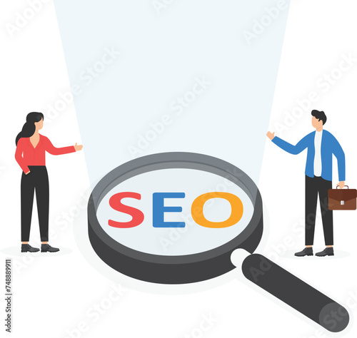 Search engine optimization concept as alphabet abbreviation SEO on magnification glass.

