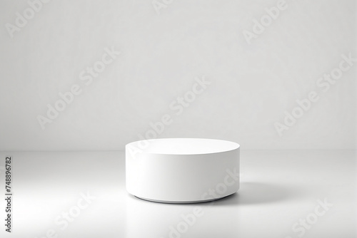 Empty pedestal display on white background with blank stand for product show or presentation