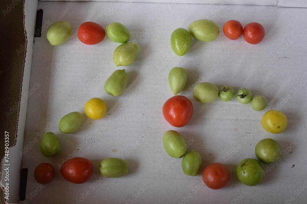number 26 formed from tomatoes
