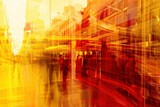 A dynamic cityscape portrayed abstractly with fiery reds and bright yellows