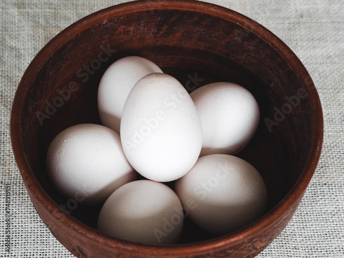 Chicken eggs in a clay bowl. Eggs to Easter