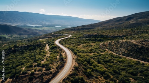 Winding mountain road from above scenic travel destination