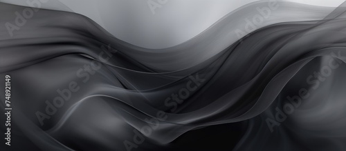A black and white cloth is draped over a surface, creating striking contrasts and textures in the abstract background. The folds and shadows of the cloth add depth and interest to the monochrome