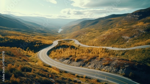 Aerial view of winding road in mountain landscape