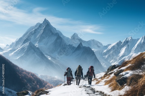 A group of friends trekking through a snow-capped mountain, slowly making their way up the white and icy terrain. They are bundled up in warm clothing, trudging through the snow with determination