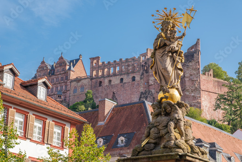 statue of Saint Mary in front of ruined castle in Heidelberg, Germany