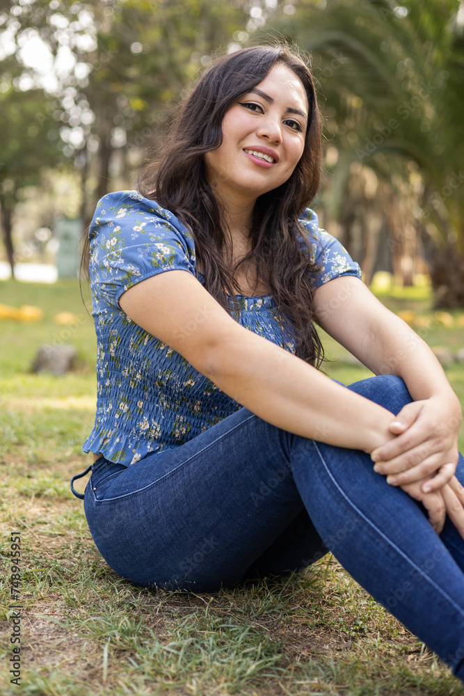 details of young latin woman with short hair wears casual clothes, youth fashion and natural beauty, sunny day and lifestyle in a park with nature details of young latin woman with short hair wears casual clothes, youth fashion and natural beauty, sunny day and lifestyle in a park with nature