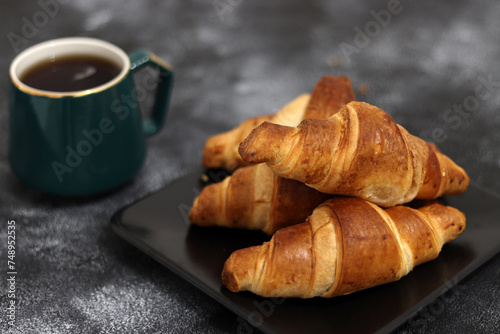 Freshly baked croissants, isolated on white background. 