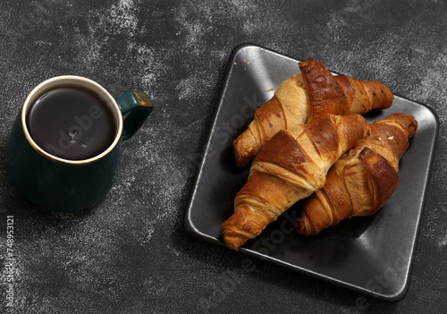 Freshly baked croissants, isolated on white background. 