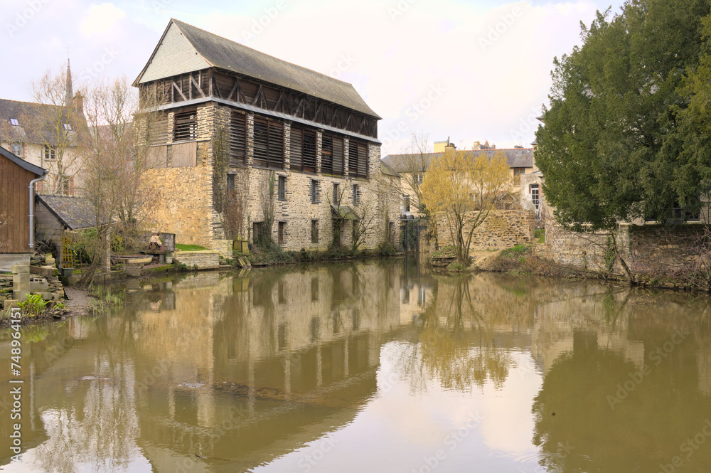 View of an old tabacco dryier building along Vilaine river in the north of France (Vitre, Brittany, France, Europe) View of an old tabacco dryier building along Vilaine river in the north of France (Vitre, Brittany, France, Europe)