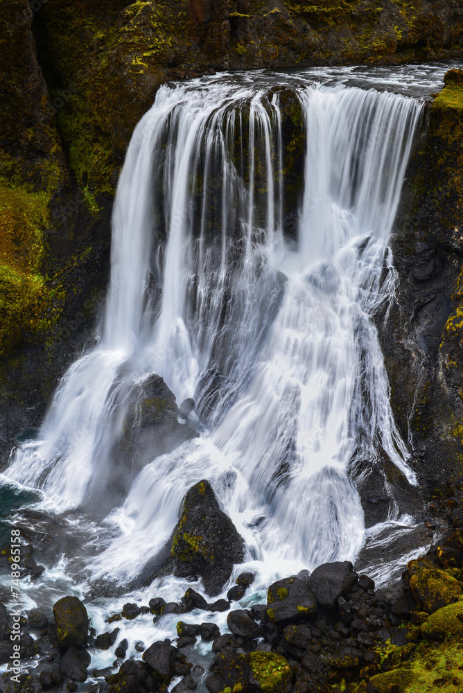 Fototapeta premium Close-up of beautiful Fagrifoss waterfall on the way from Kirkjubæjarklaustur to Lakagígar, Iceland.