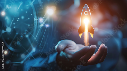 A person is seen holding a lit rocket in their hand, ready to launch it into the sky. Symbol for fast business success or startup business concept photo